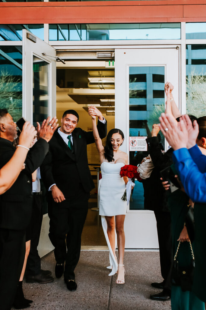 couple exiting courtroom after ceremony
