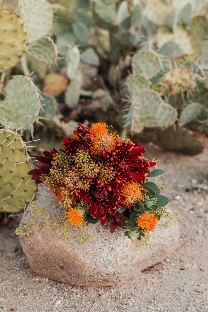 Close-up of the bride’s bouquet in the soft morning light at a sunrise elopement