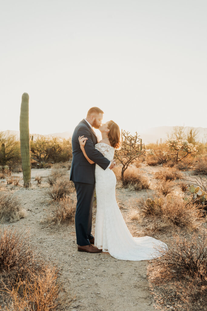 Bride and groom embrace at dawn Sabino Canyon Tucson elopement