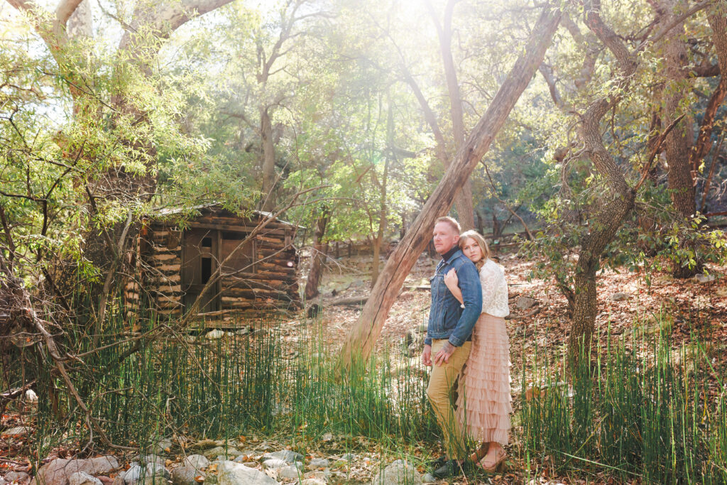 engaged couple stand near creek in ramsey canyon preserve in sierra vista arizona