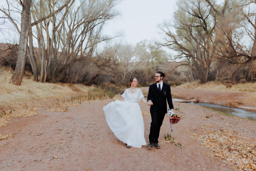 Sierra Vista Wedding photographer captures bride and groom by the san carlos river