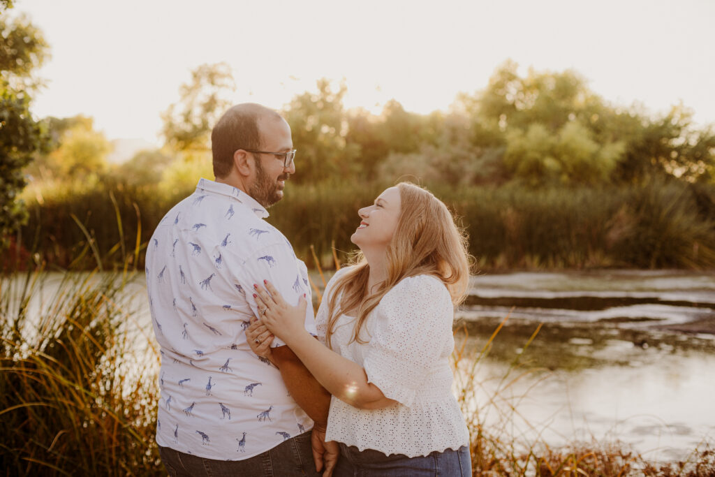 Sweetwater Wetlands Tucson engagement photos with green marsh backdrop